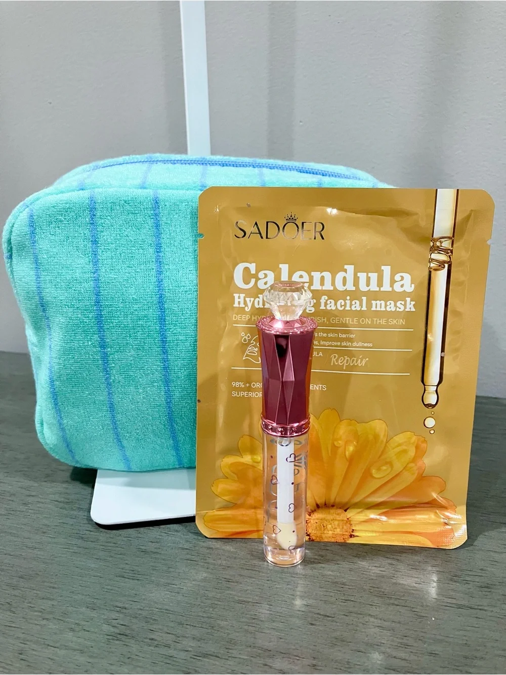 Makeup bag, SADOER Calendula Hydrating Facial Mask and lip gloss bundle